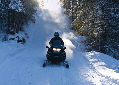 Snowmobiling. Lake Louise Mountain Resort.